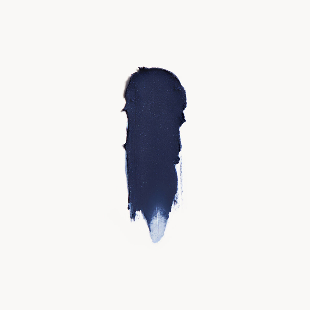 Navy blue cream eye shadow swatch on a white background