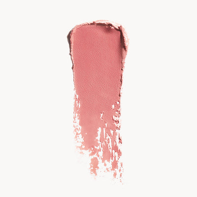 Pink lipstick swatch on a white background