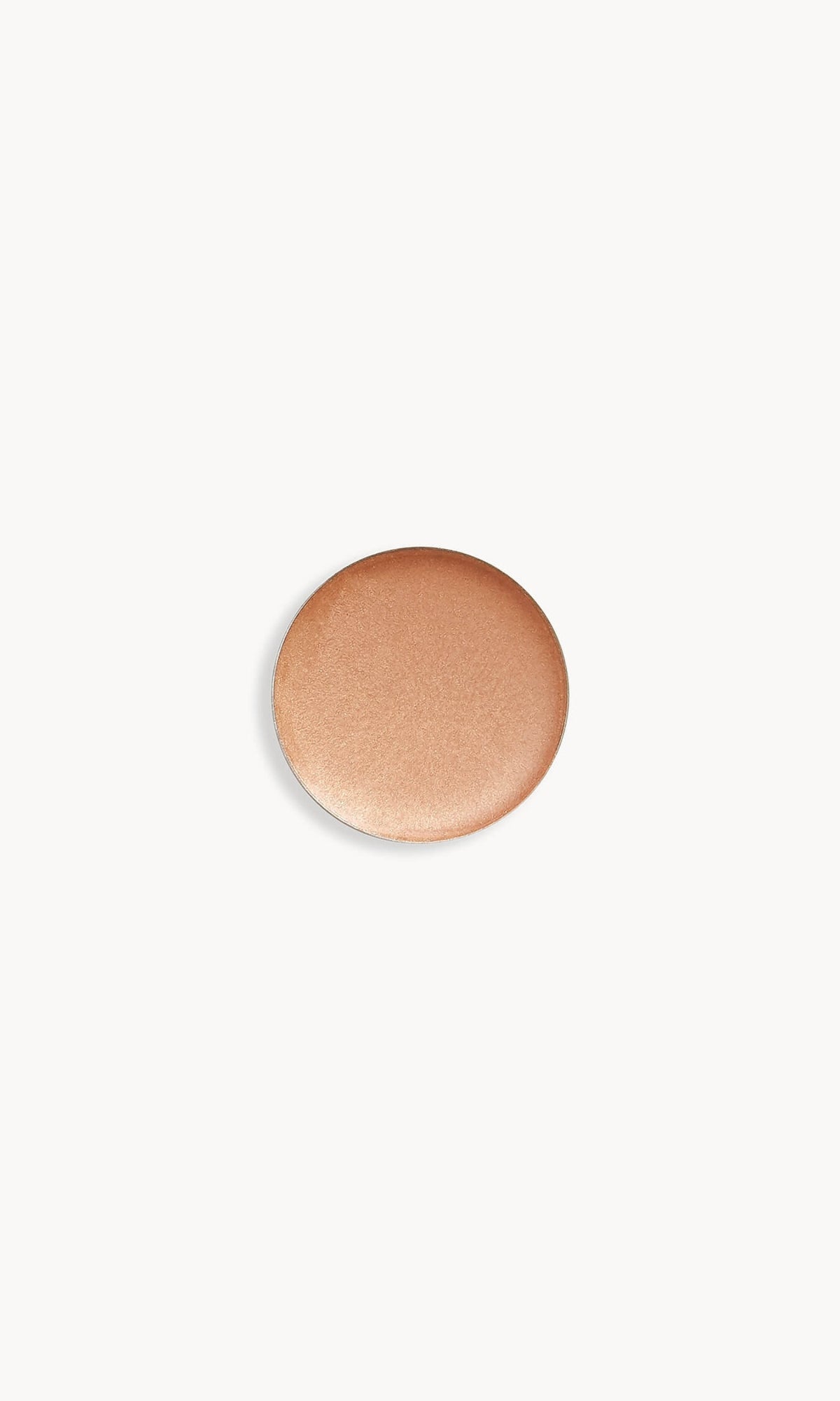 Refill pan of the Kjaer Weis Cream Eye Shadow in the shade Golden, an iridescent peach gold color.