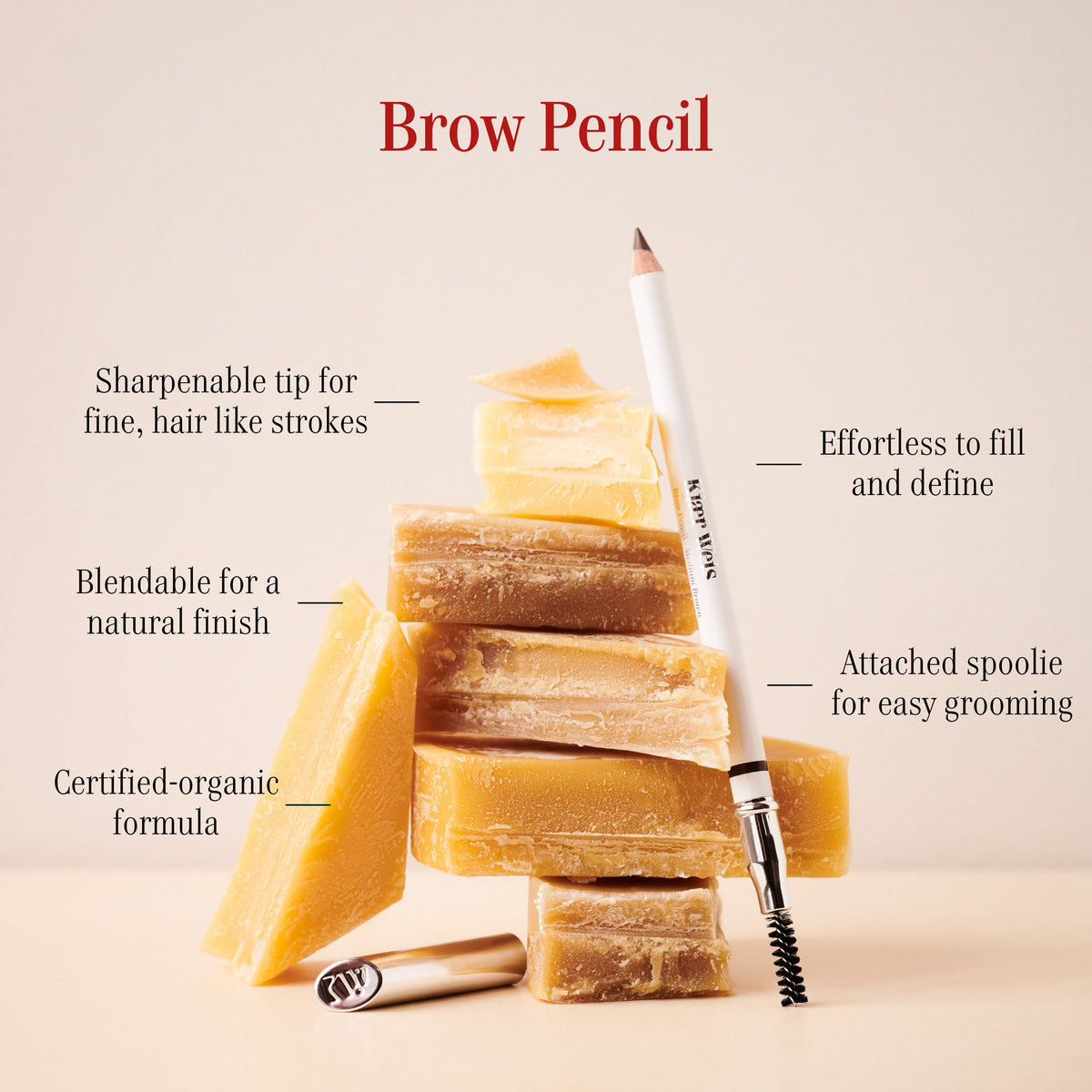 Brow pencil with benefits highlighted on a beige background: Sharpenable tip; Blendable for a natural finish; Certified organic formula; Effortless to fill and define; and Attached spoolie for easy grooming.