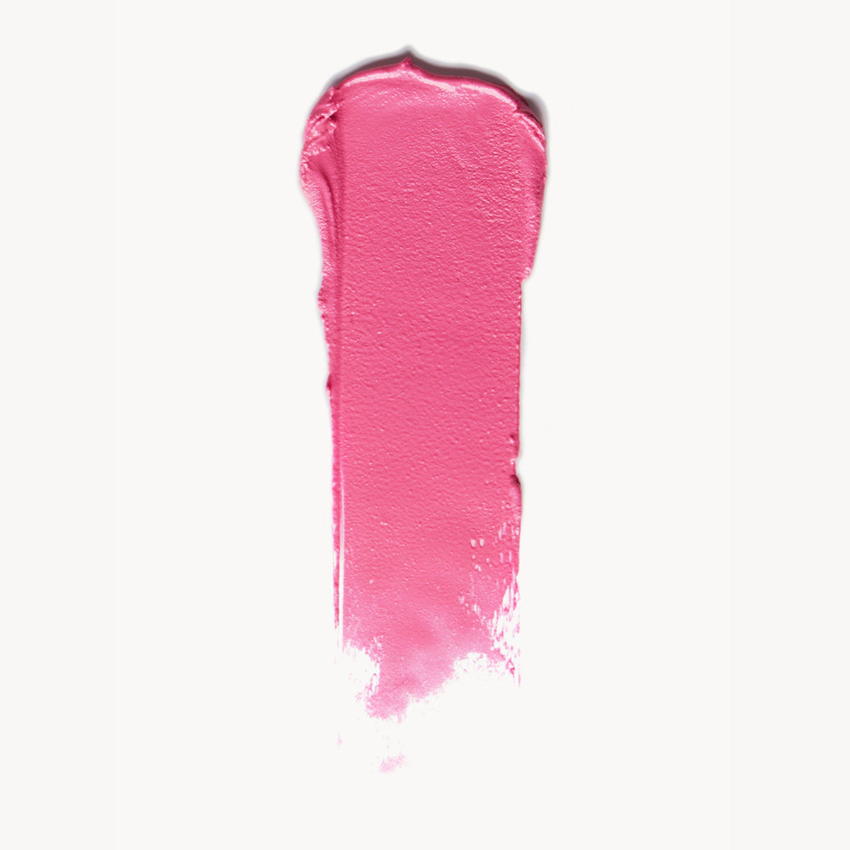 A wipe of vibrant pink cream blush on a white background